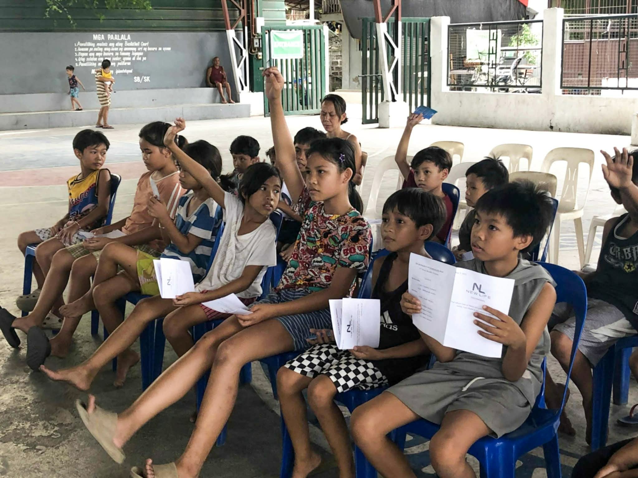 Students in a small group with Bibles and notebooks